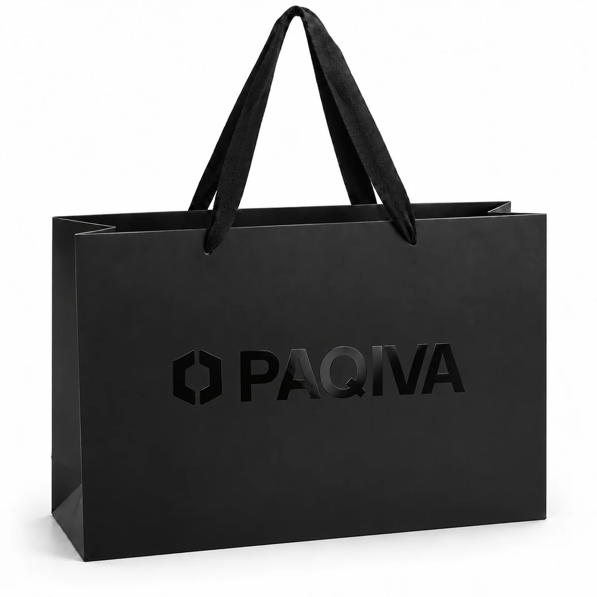 Black paper bag with a glossy black PAQIVA logo contrasted against the surrounding surface.