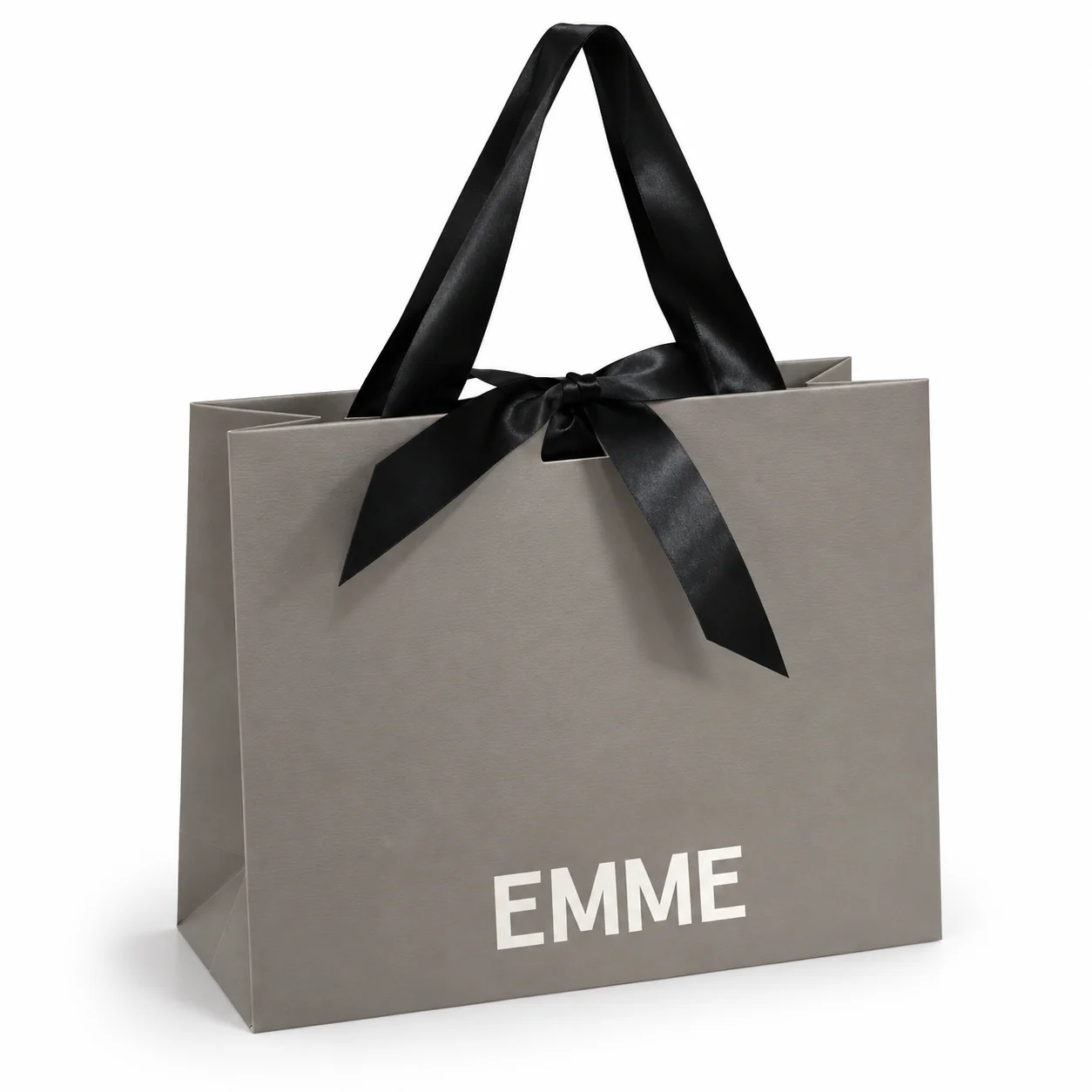 Front view of a grey paper bag with black satin carrying ribbons tied into a decorative bow.