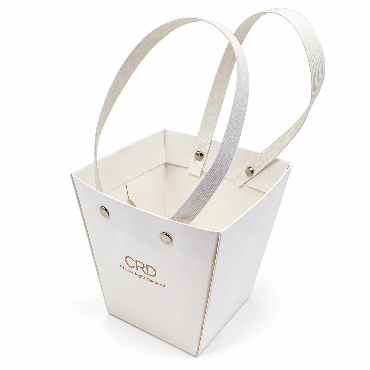 Compact white paper bag viewed from above, with white ribbed handles and metal rivets.