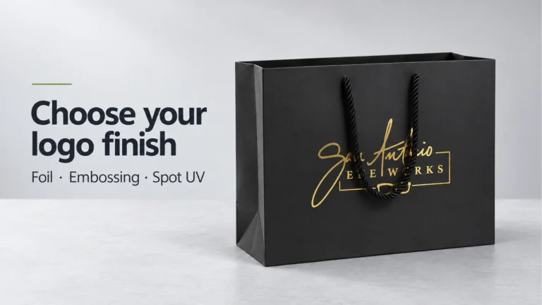 Black paper bag with a gold-coloured San Antonio EYEWORKS logo beside the words Choose your logo finish