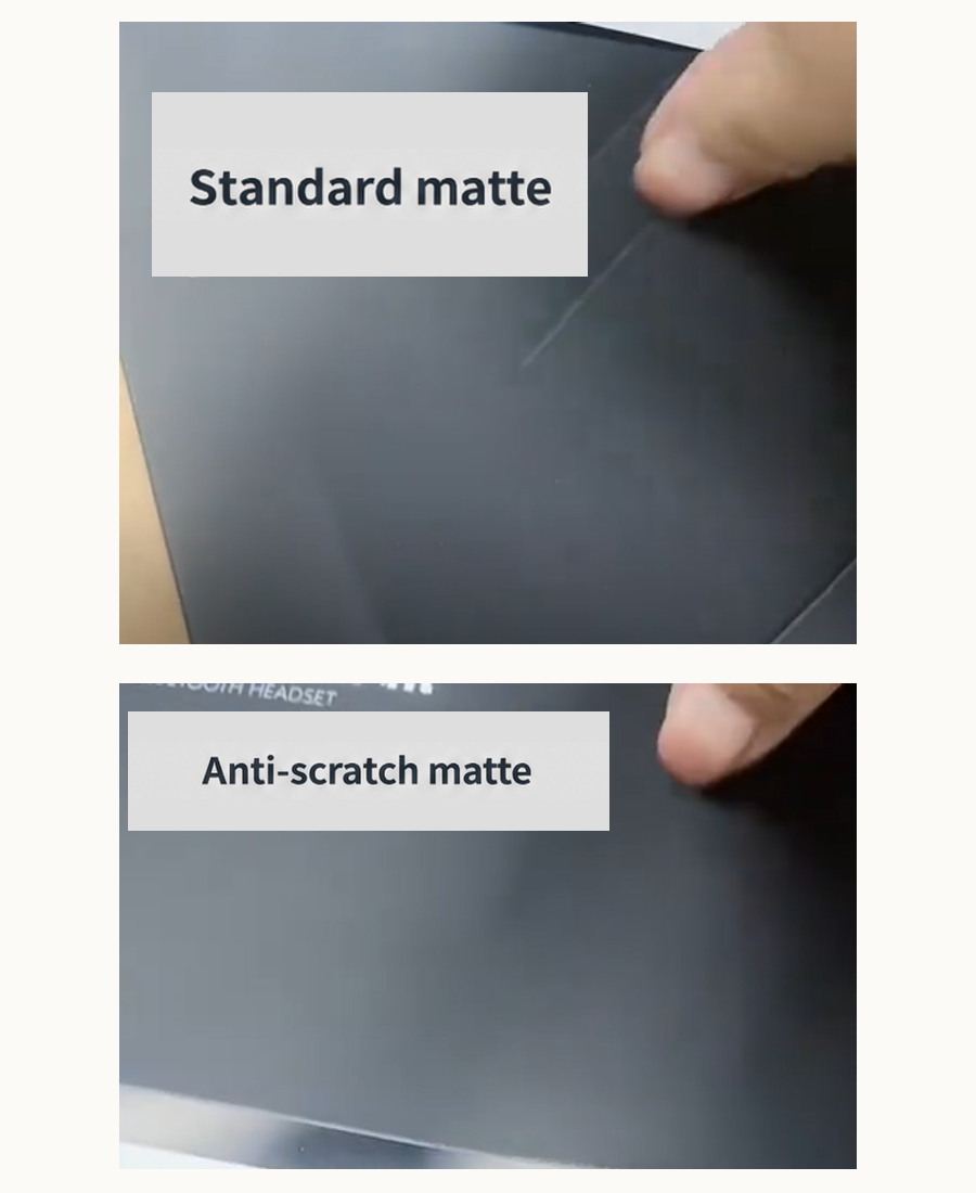 Supplied standard-matte and anti-scratch-matte panels compared after the same rubbing method, with a visible pale diagonal mark on the standard-matte panel