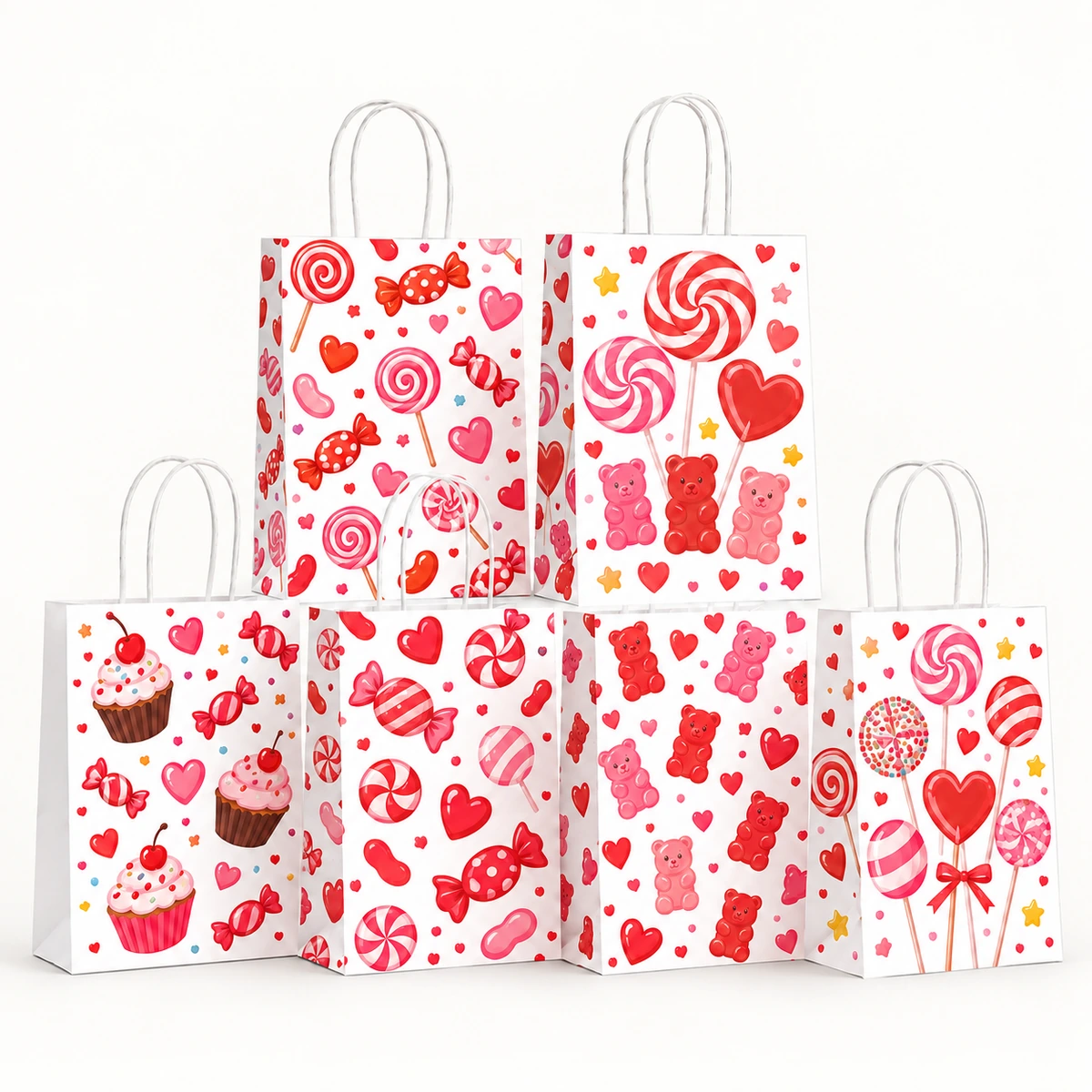 Six white paper gift bags printed with red and pink sweets, lollipops, hearts, gummy bears and cupcakes