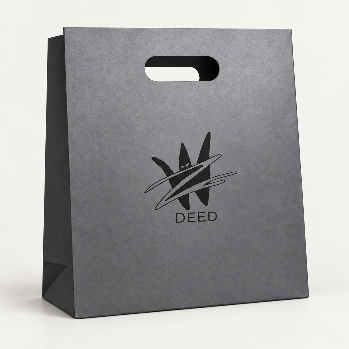 Dark gray paper bag with an oval carrying opening and black printed logo