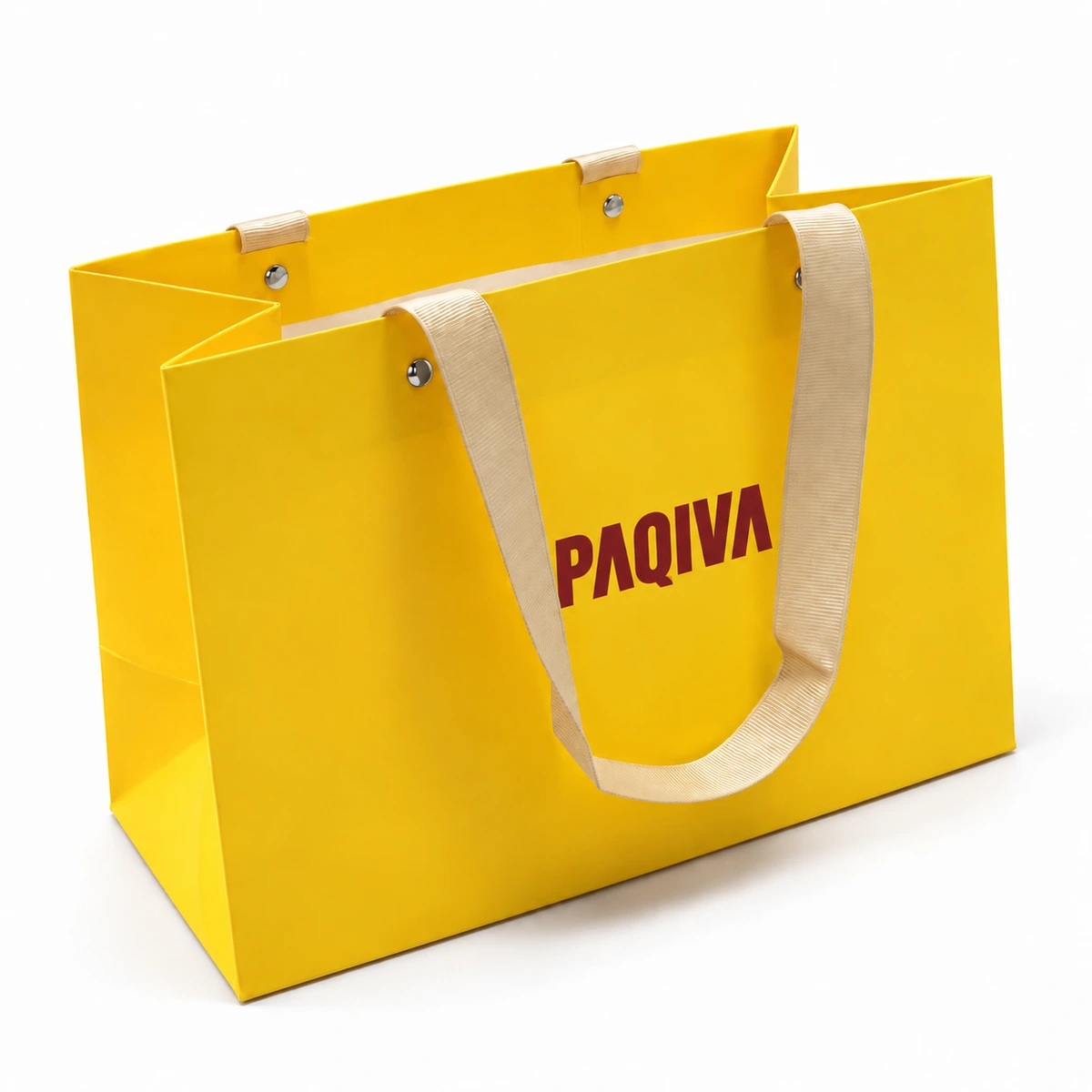 Yellow PAQIVA paper bag with cream ribbed ribbon draped across the front and visible round fixings at the top