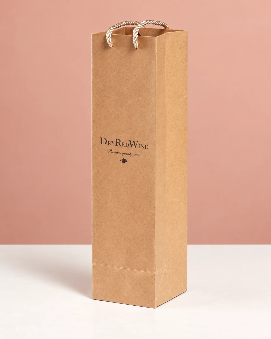 A natural brown wine paper bag with dark lettering and light-coloured cord handles.