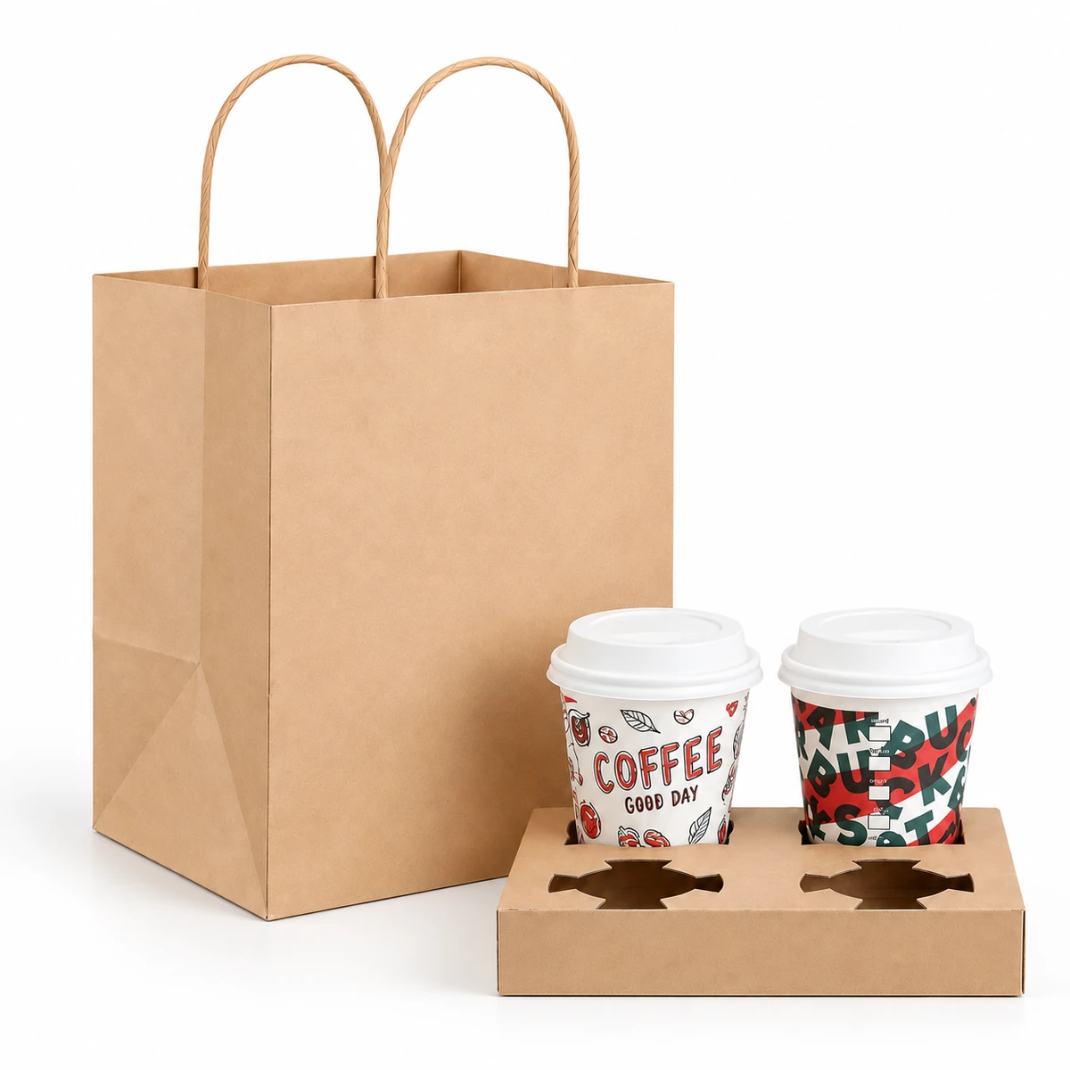 A wide kraft paper bag beside a four-position cardboard cup carrier with two lidded cups and two empty openings.