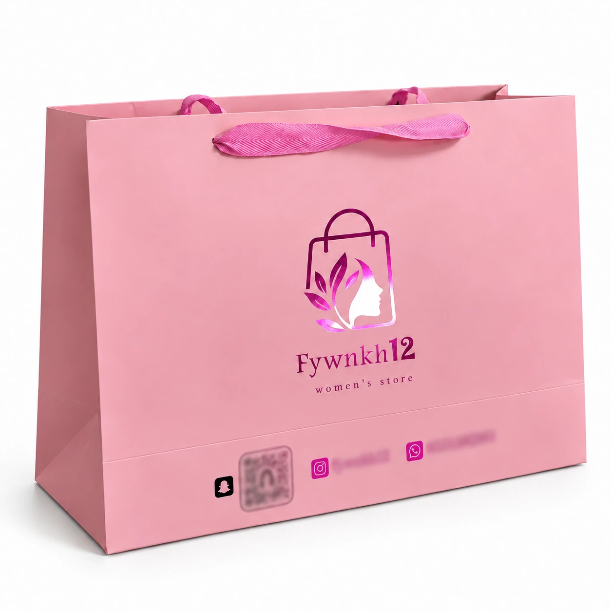 Pink paper bag with a central brand design above social icons, a blurred code and blurred contact details near the bottom.