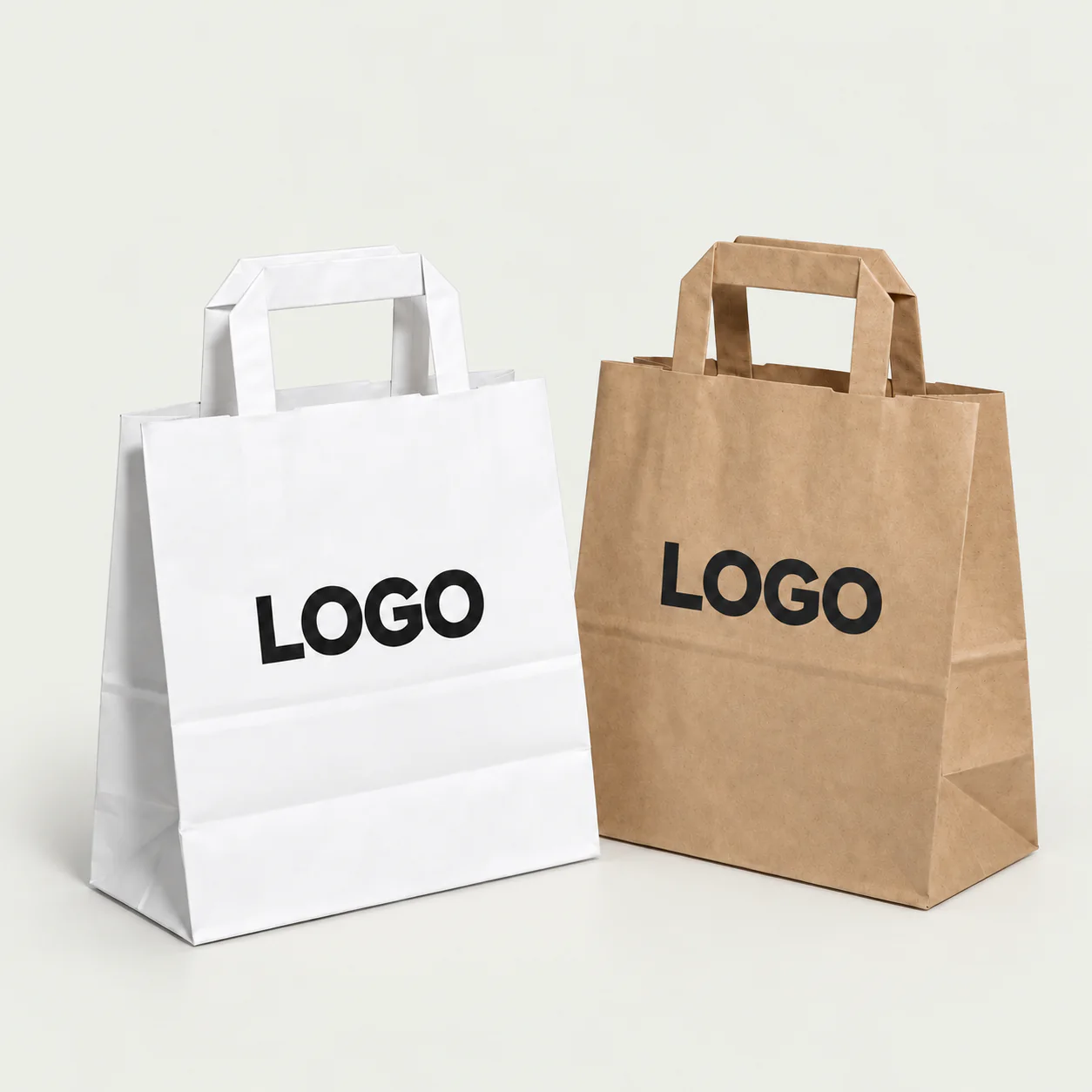 White and natural kraft paper bags with flat paper handles.